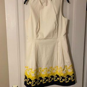 Beautiful white dress with detailing on bottom